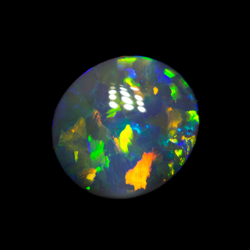 1.27 ct black opal 8.7x7.9x2.8mm