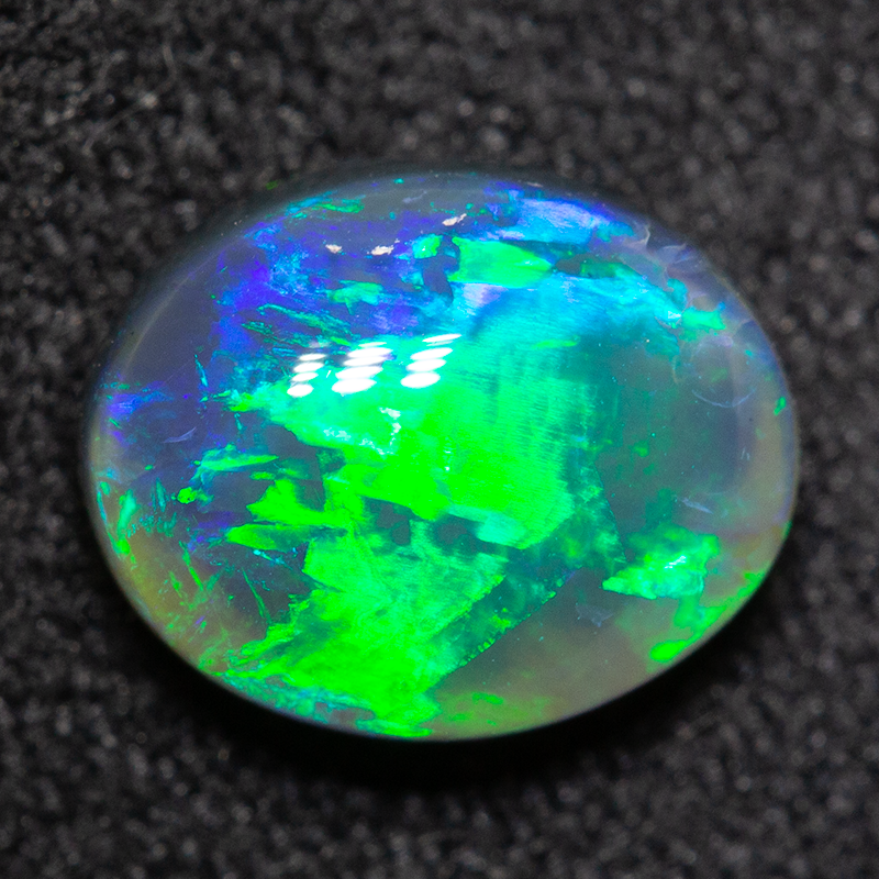 1.29 ct black opal 8.2x6.6x3.9mm