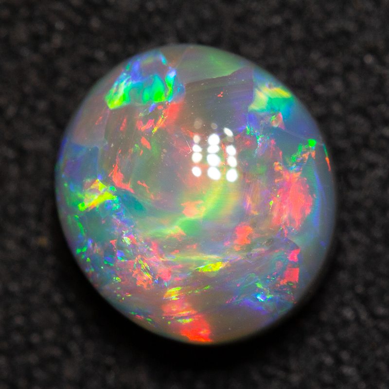 1.31 ct black opal 7.5x6.8x4.2mm