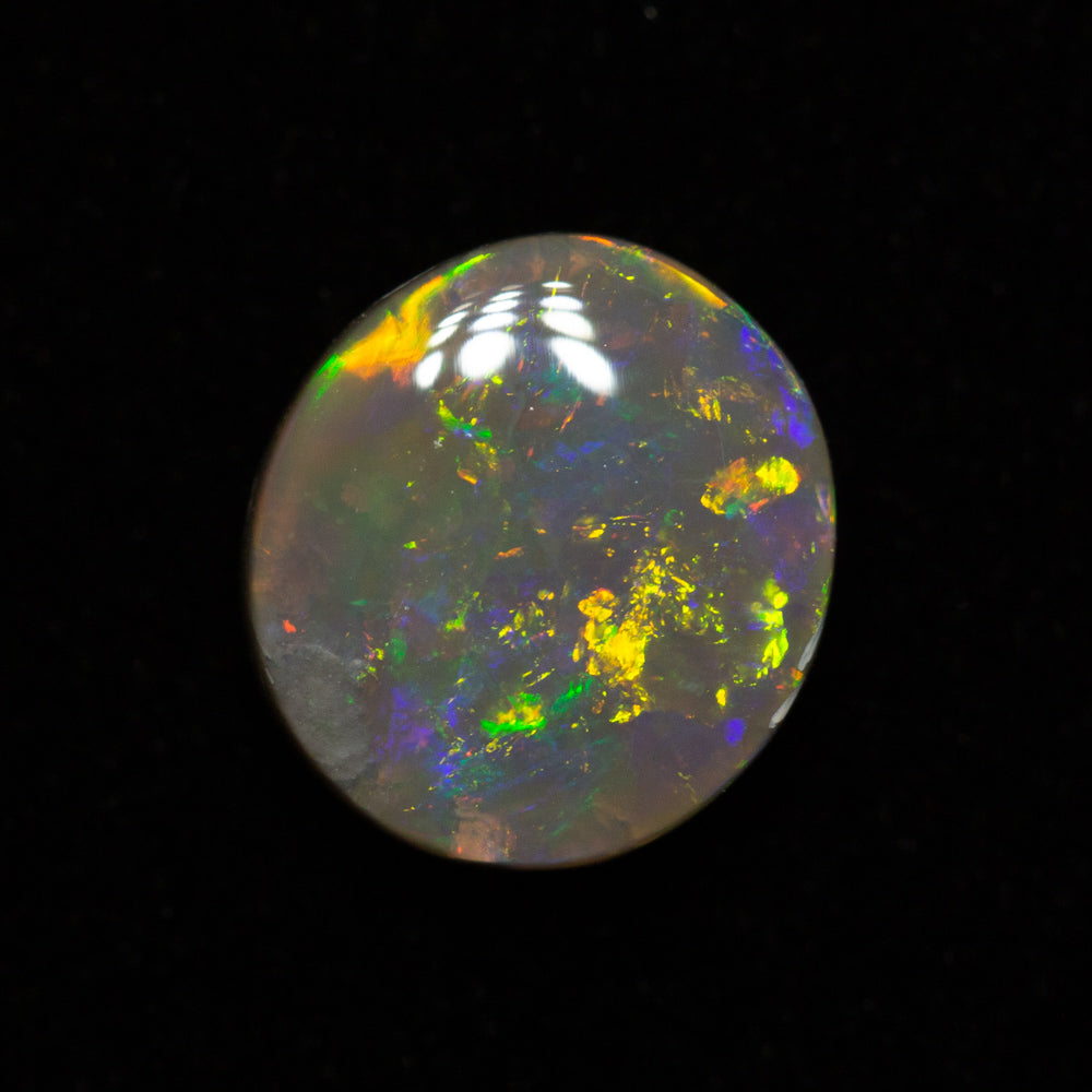 1.31 ct dark opal 8.3x7.5x3.1mm