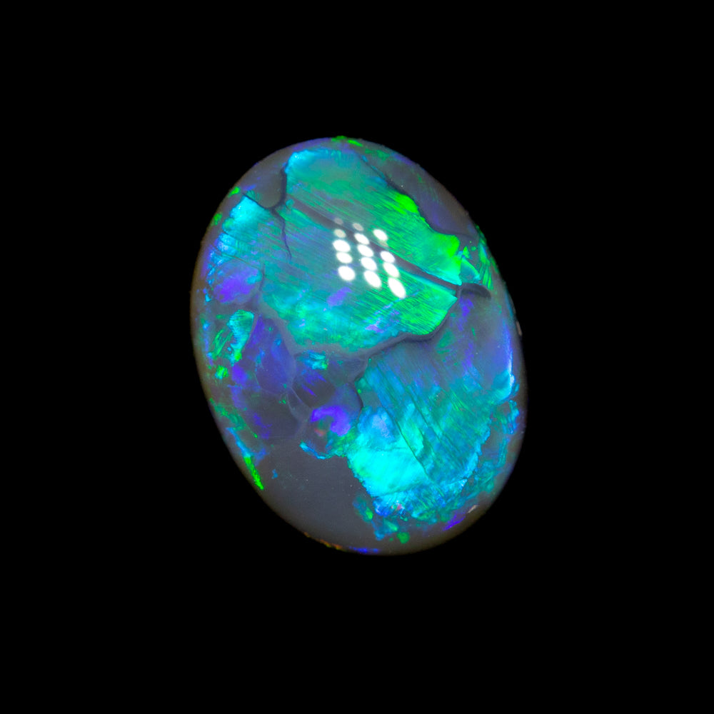 1.33 ct dark crystal opal 8.5x6.4x3.8mm