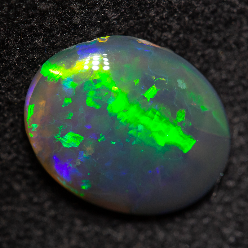 1.34 ct black opal 9.5x7.6x3.1mm