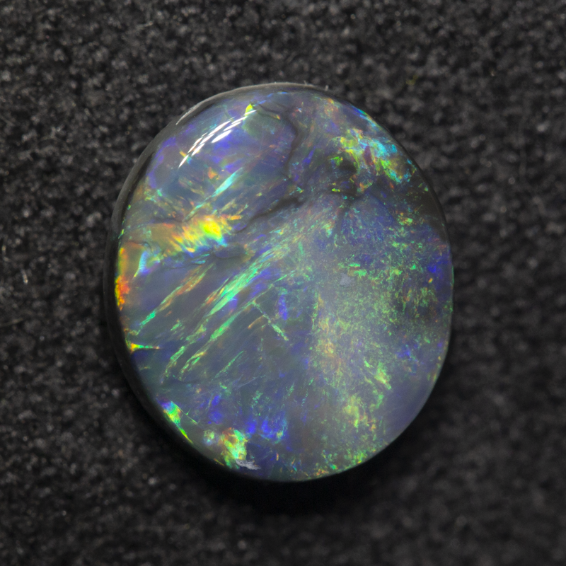 1.34 ct dark opal 8.6x7.6x3.2mm