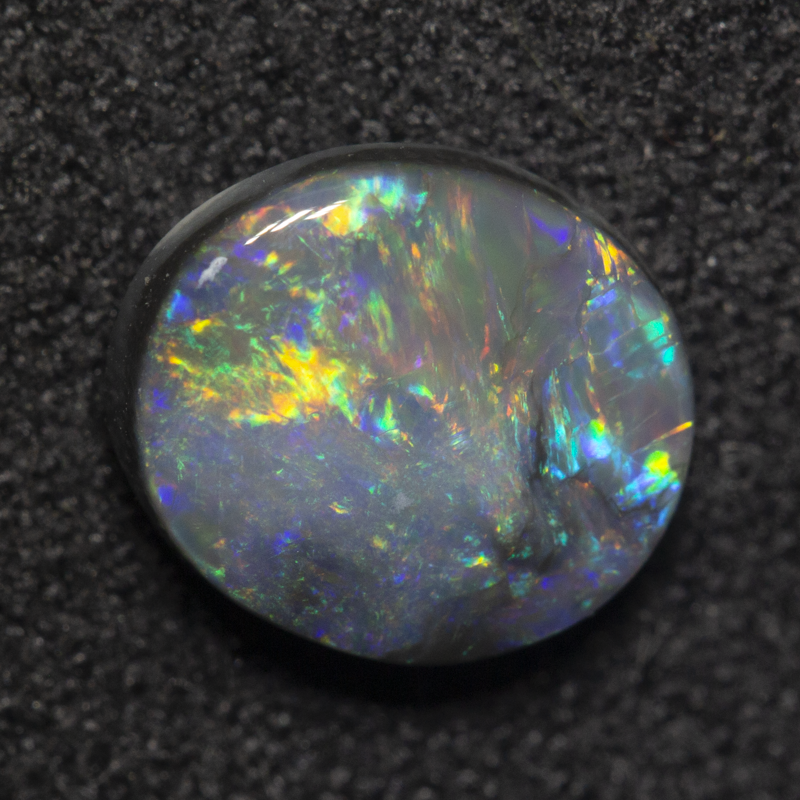 1.34 ct dark opal 8.6x7.6x3.2mm