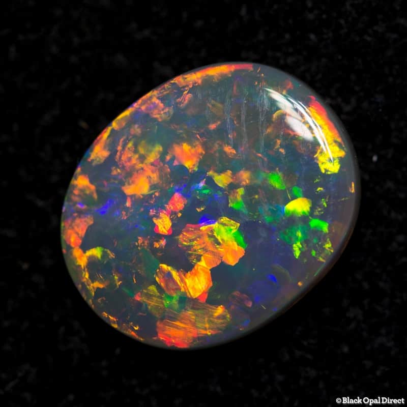1.38 ct orange green crystal opal 10x8x2mm