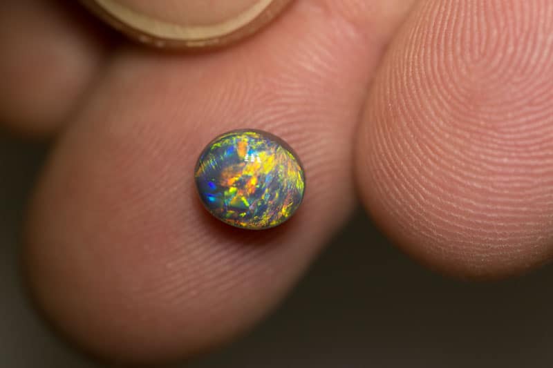 1.38 ct dark opal 7x6x5mm
