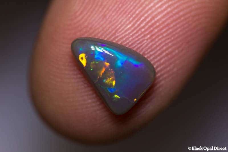 1.38 ct baroque semi black opal 10x7x3mm