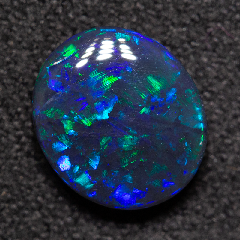 1.39 ct double-sided black opal 8.8x7.7x3.4mm