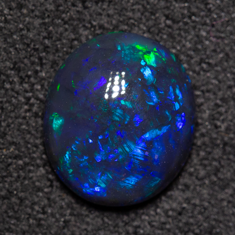 1.39 ct double-sided black opal 8.8x7.7x3.4mm