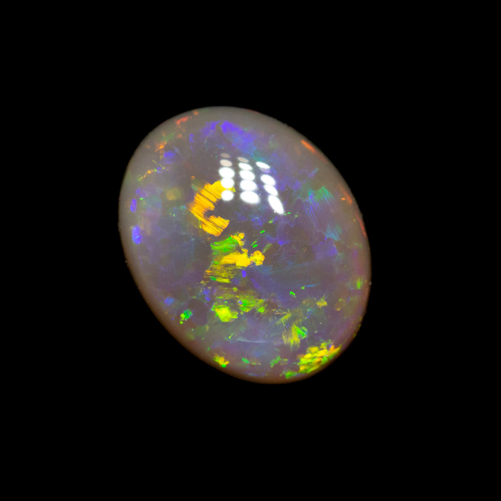 1.40 ct black opal 8.4x6.7x3.9mm