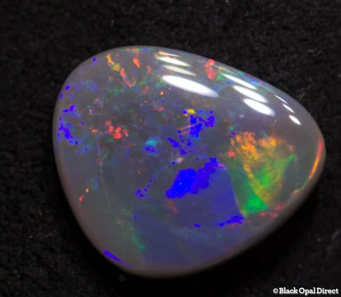 1.40 ct semi black opal 9x8x3mm