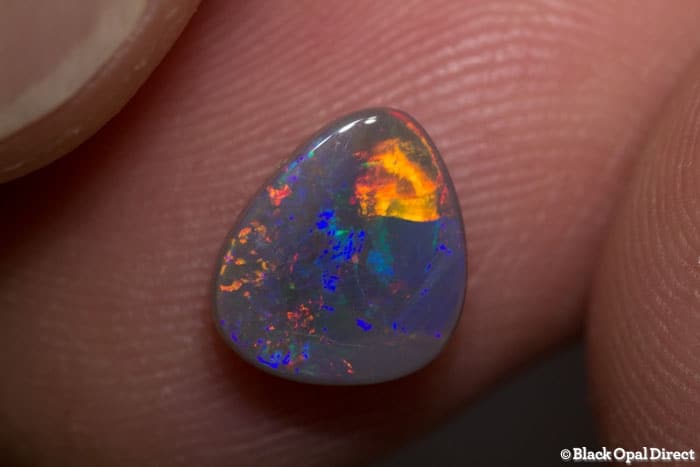 1.40 ct semi black opal 9x8x3mm