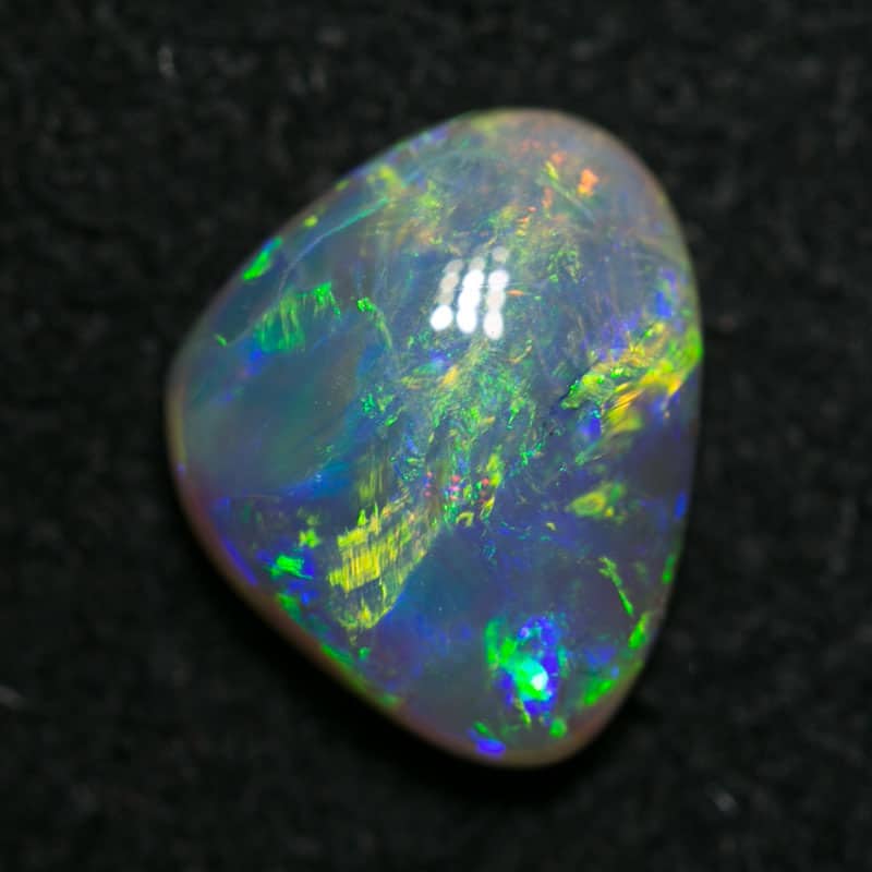 1.41 ct Baroque dark crystal opal 9x7x3mm