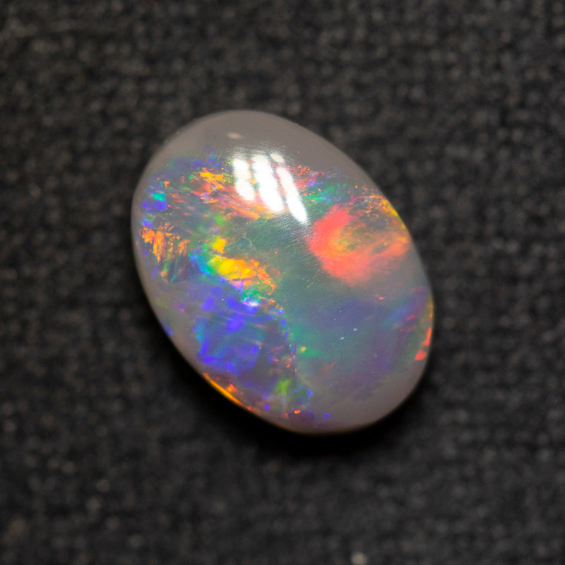 1.42 ct dark opal 8.6x6.3x3.9mm