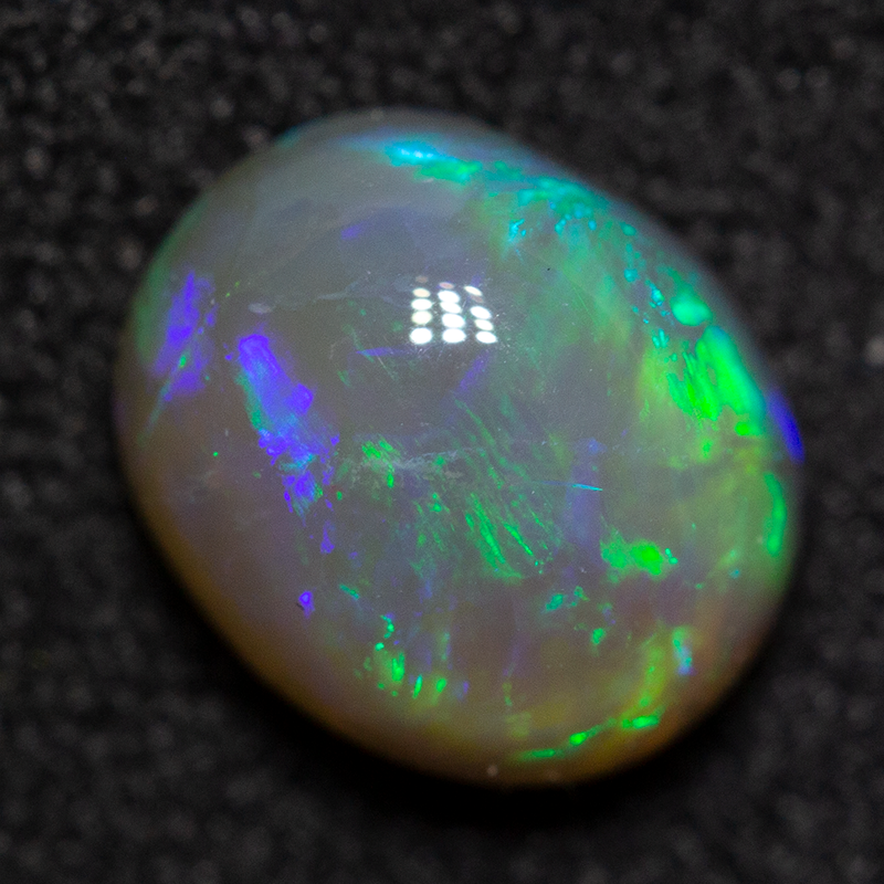 1.44 ct dark crystal opal 7.9x6.6x4.3mm