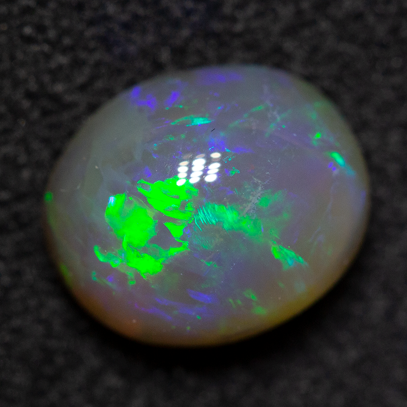 1.44 ct dark crystal opal 7.9x6.6x4.3mm