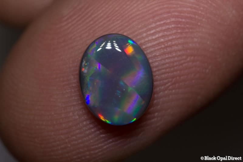 1.44 ct ribbon pattern black opal 9x7x3mm
