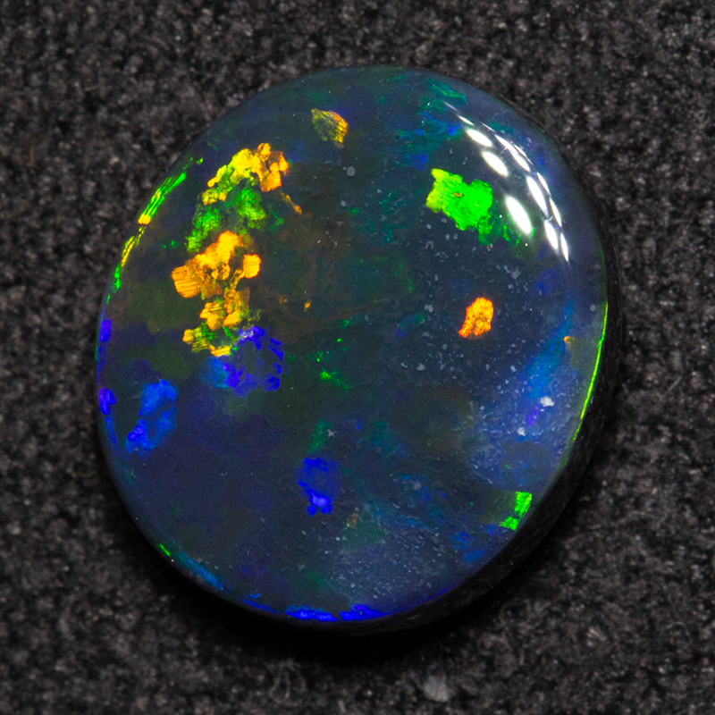 1.46 ct black opal 9.1x8.1x3.1mm