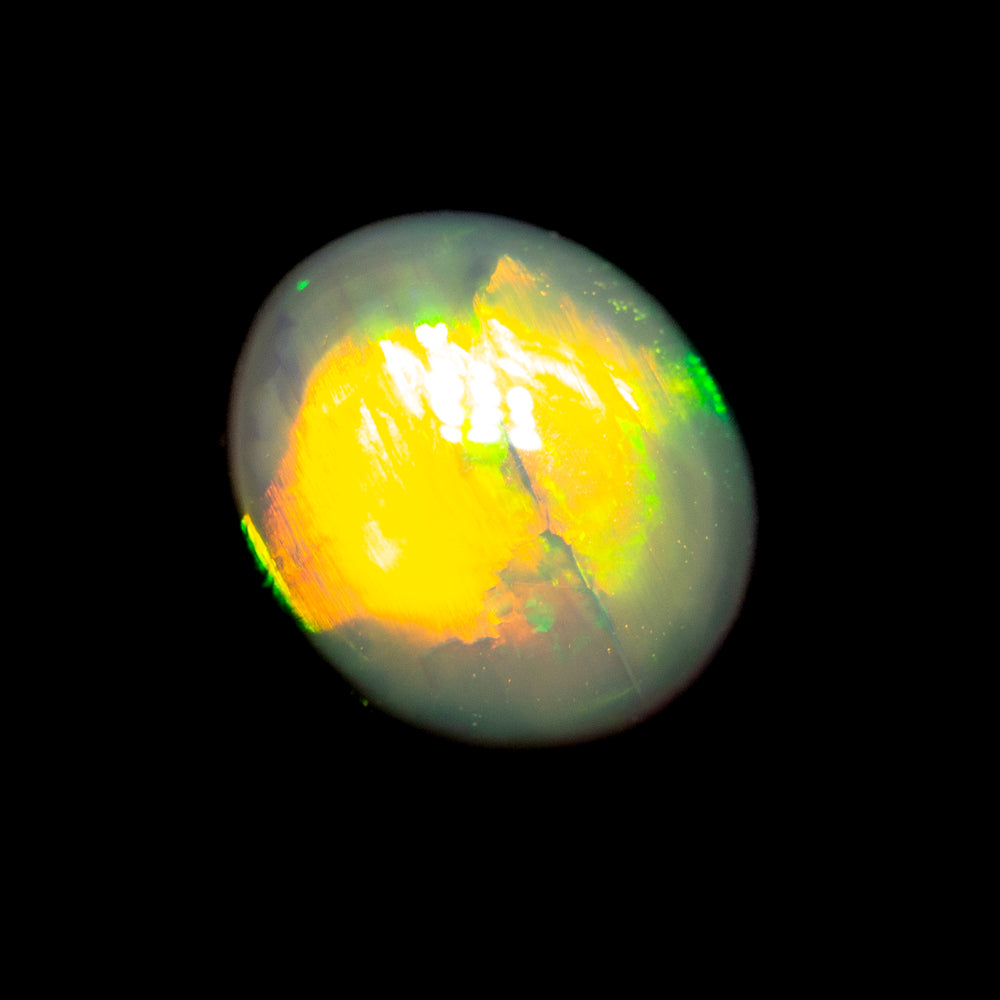 1.48 ct gem double-sided black opal 7.4x6.4x5.1mm