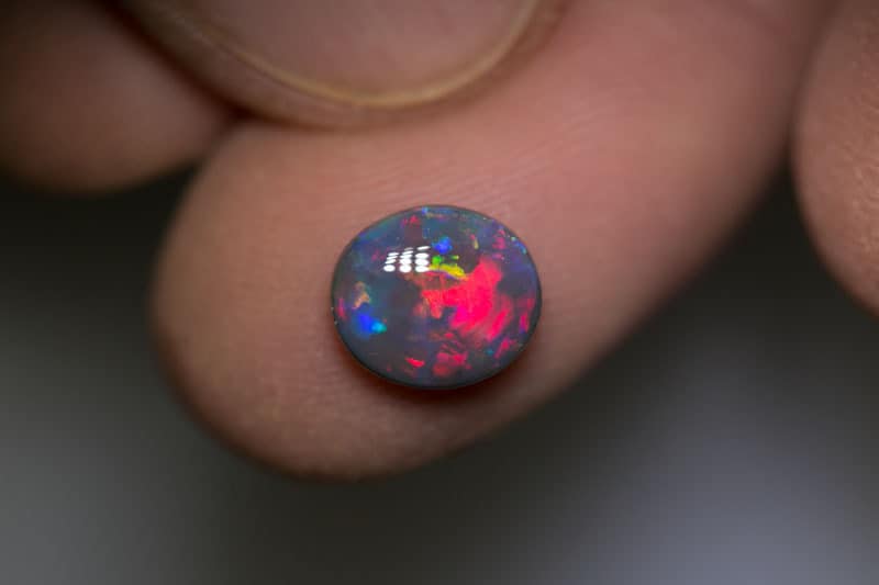 1.48 ct pink on black opal 8.8x7.7x3mm