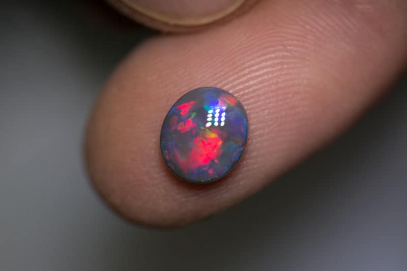 1.48 ct pink on black opal 8.8x7.7x3mm