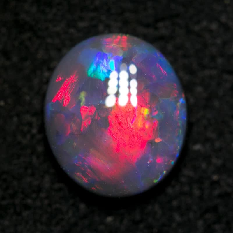 1.48 ct pink on black opal 8.8x7.7x3mm