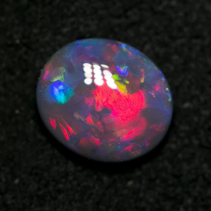 1.48 ct pink on black opal 8.8x7.7x3mm