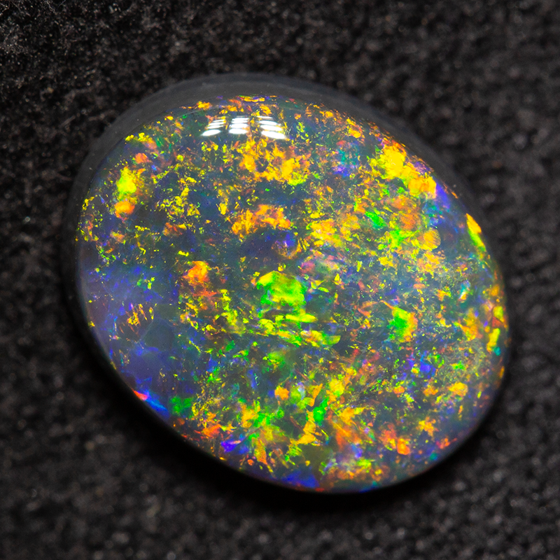 1.50 ct black opal 9.5x7.6x2.9mm