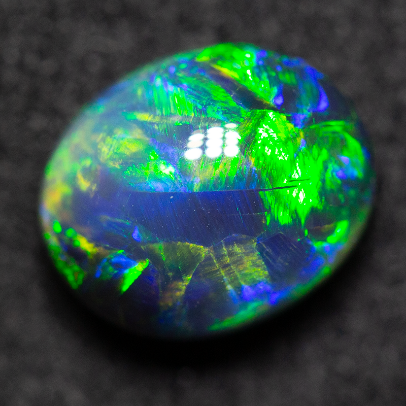 1.52 ct black opal 7.5x6.2x4.9mm