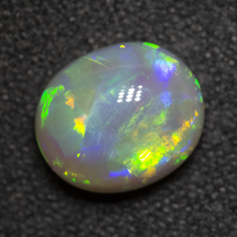 1.54 ct dark opal 8x6.8x4.6mm