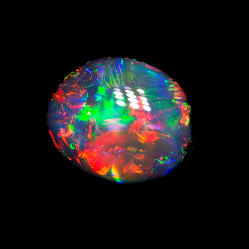 1.54 ct gem black opal 8.2x6.9x4.1mm