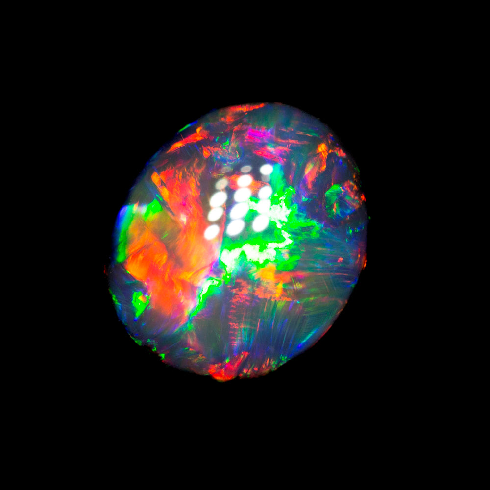 1.54 ct gem black opal 8.2x6.9x4.1mm