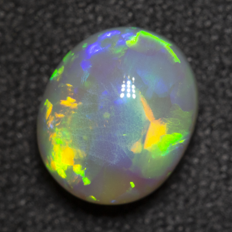1.54 ct dark opal 8x6.8x4.6mm