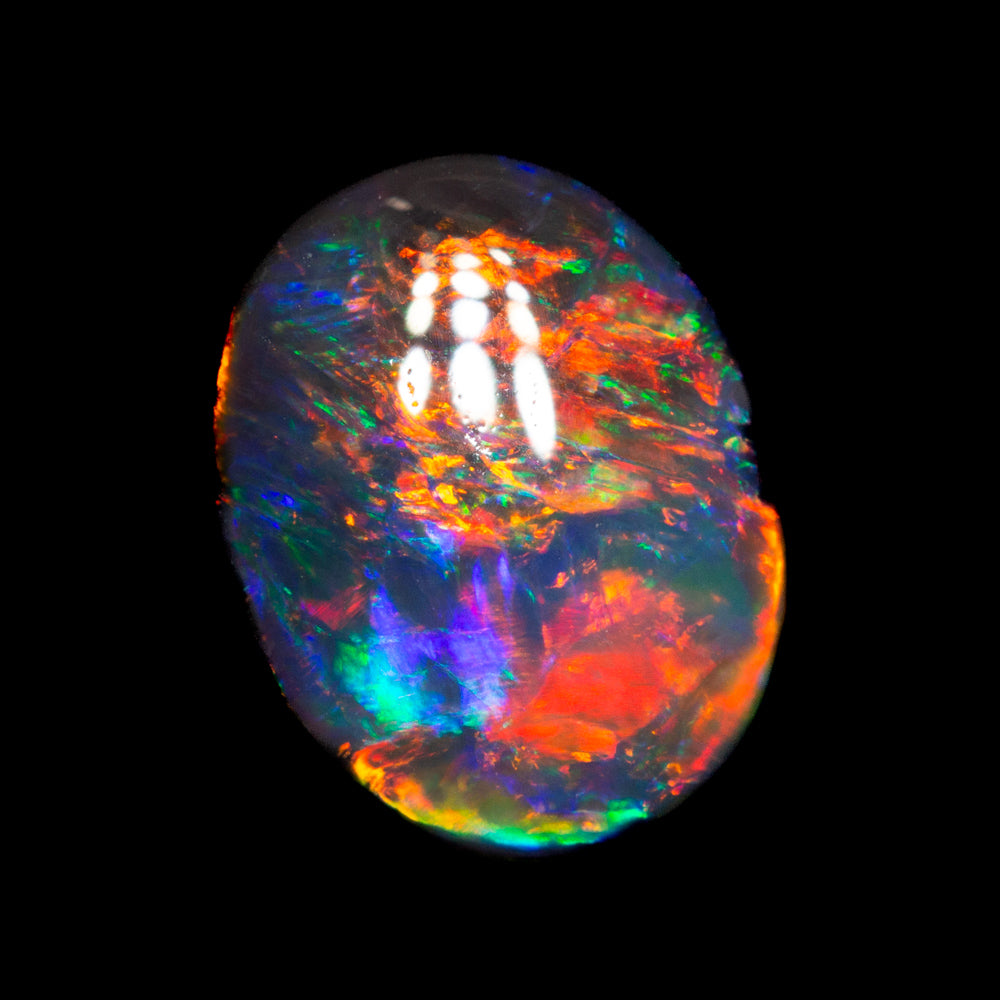 1.55 ct gem black opal 9.2x7.3x3.3mm