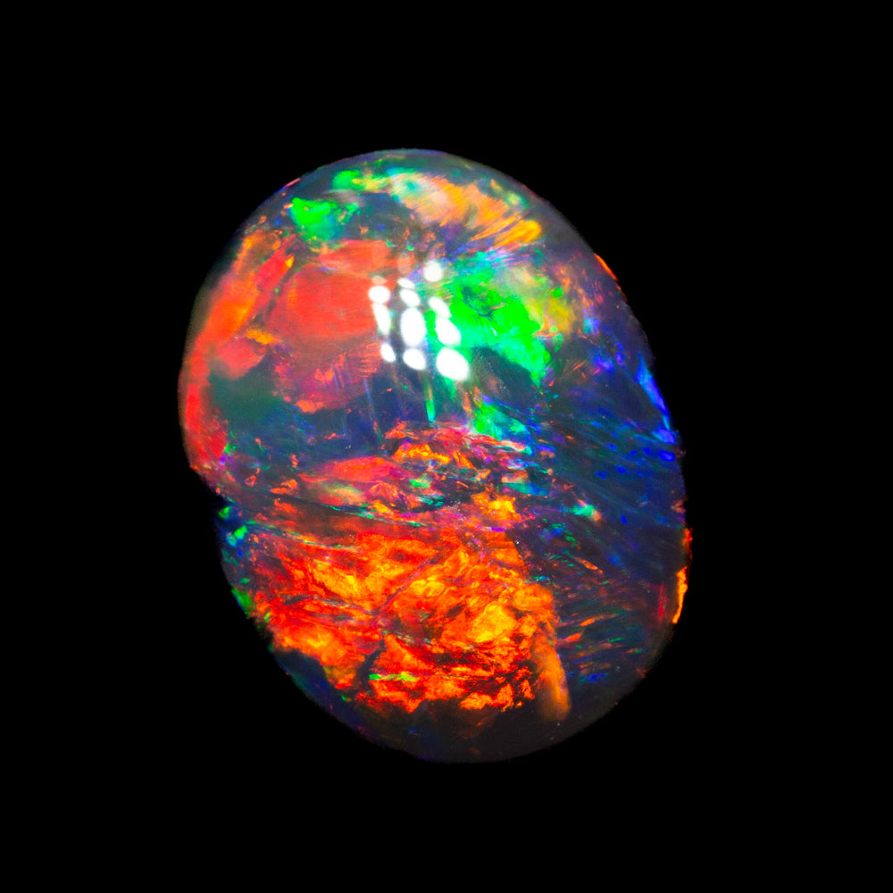 1.55 ct gem black opal 9.2x7.3x3.3mm