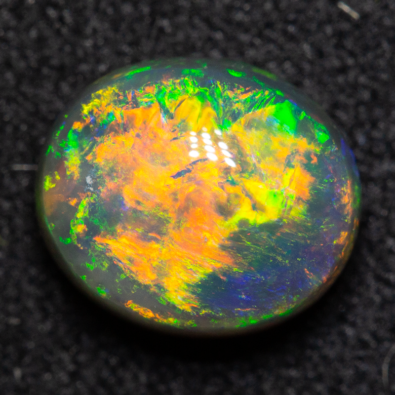 1.57 ct gem double-sided black opal 8x6.9x4.4mm