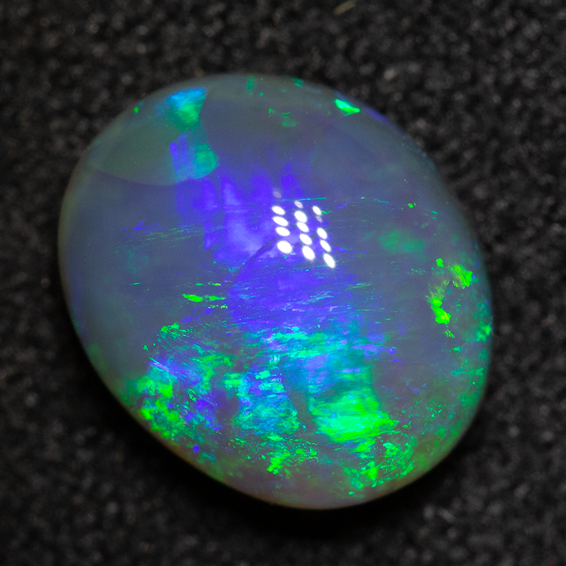 1.59 ct dark crystal opal 8.6x7.2x4.3mm