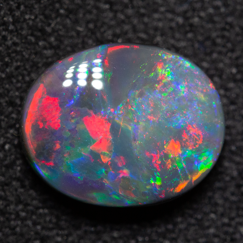 1.60 ct black opal 9x7.3x3.8mm