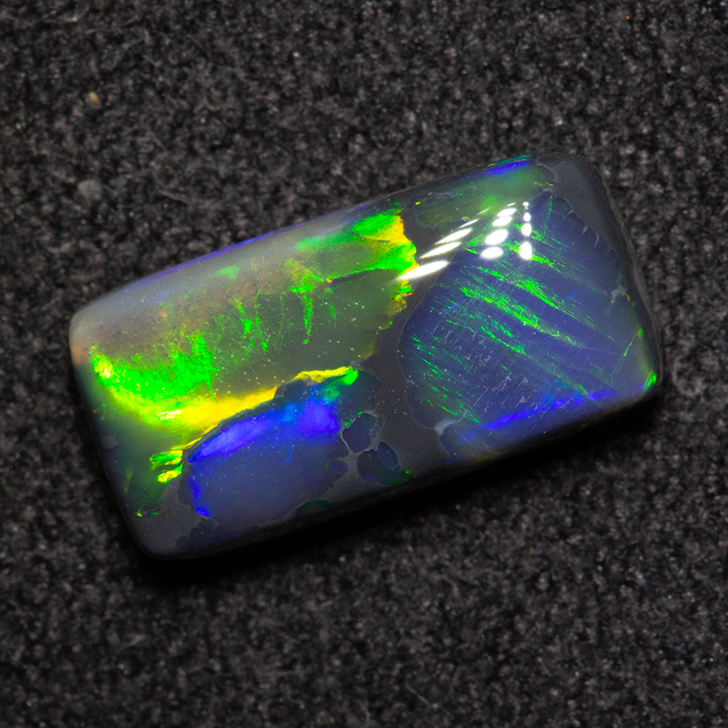 1.60 ct black opal 10.6x5.4x3.3mm