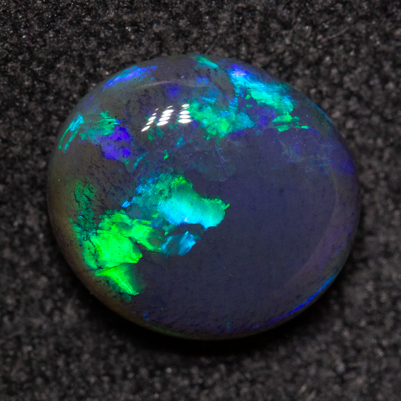 1.60 ct black opal 8.4x7.6x3.9mm