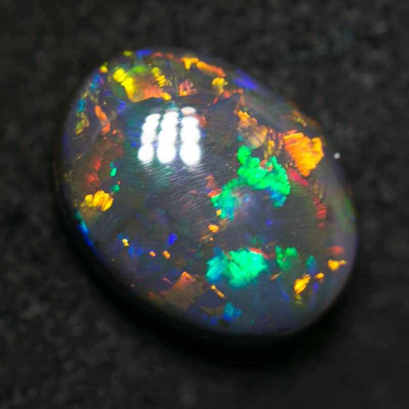 1.60 ct black opal 9x7x3.5mm