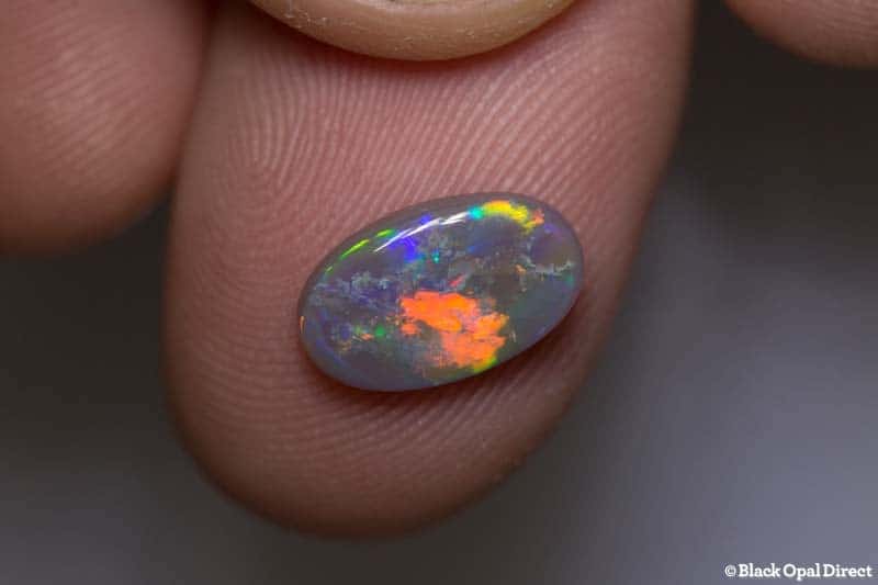 1.61 ct semi black opal 11x7.5x2.5mm