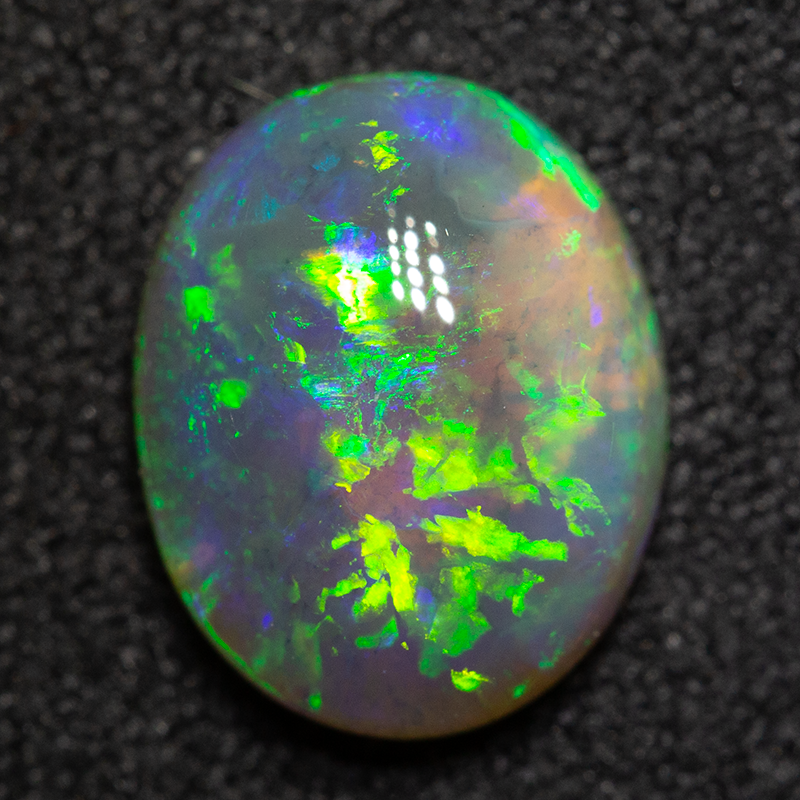 1.63 ct black crystal opal 9.3x7.4x3.9mm