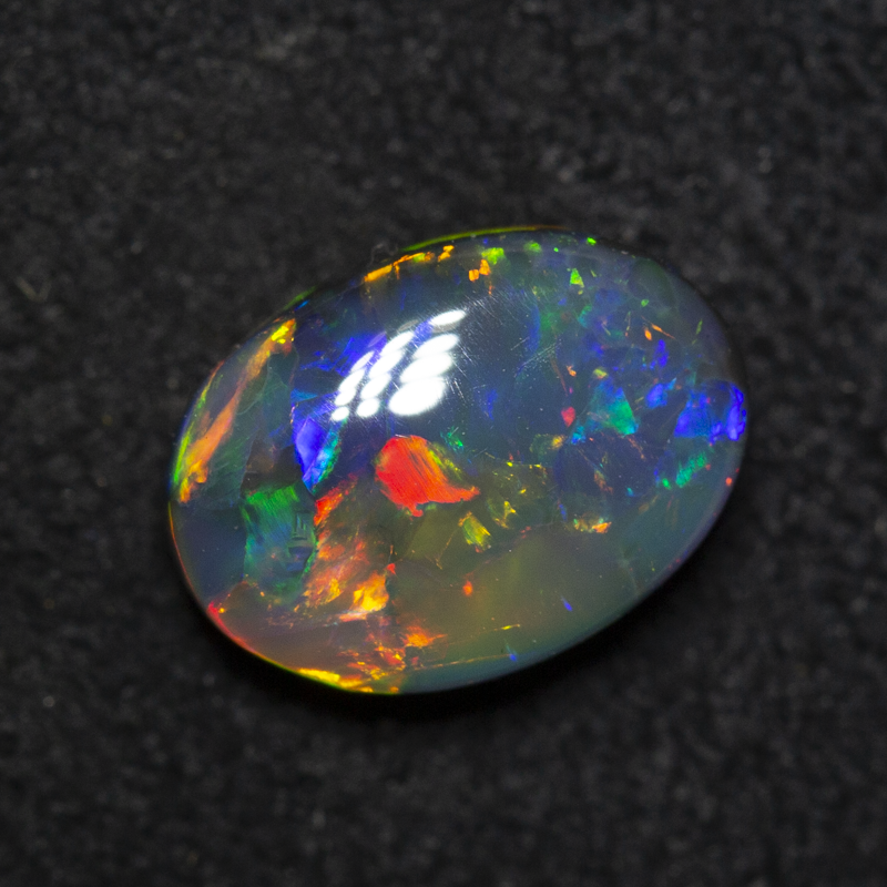 1.64 ct black opal 9.4x6.8x3.9mm