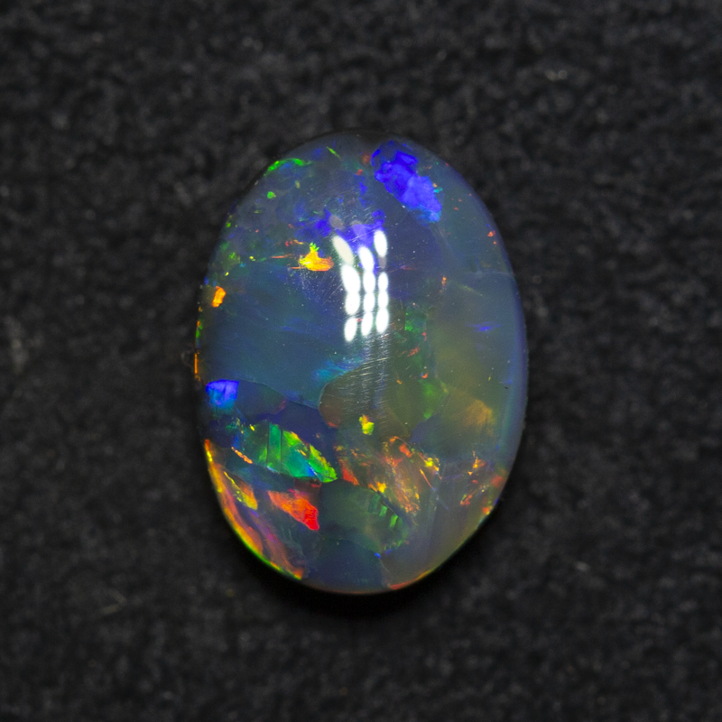1.64 ct black opal 9.4x6.8x3.9mm