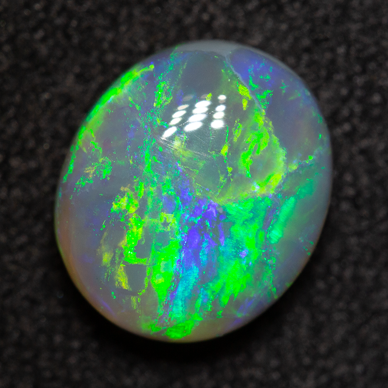 1.66 ct dark opal 8.6x7.4x3.9mm