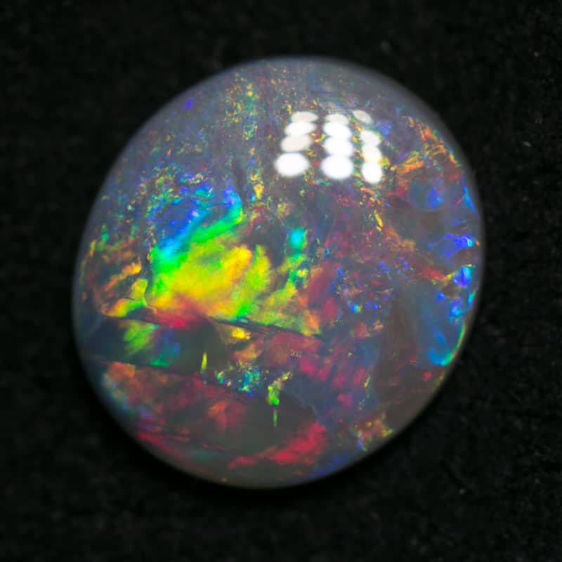 1.67 ct dark opal 10x9x2.5mm