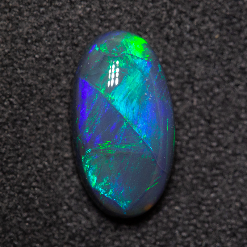 1.71 ct black opal 11.2x6.1x3.7mm