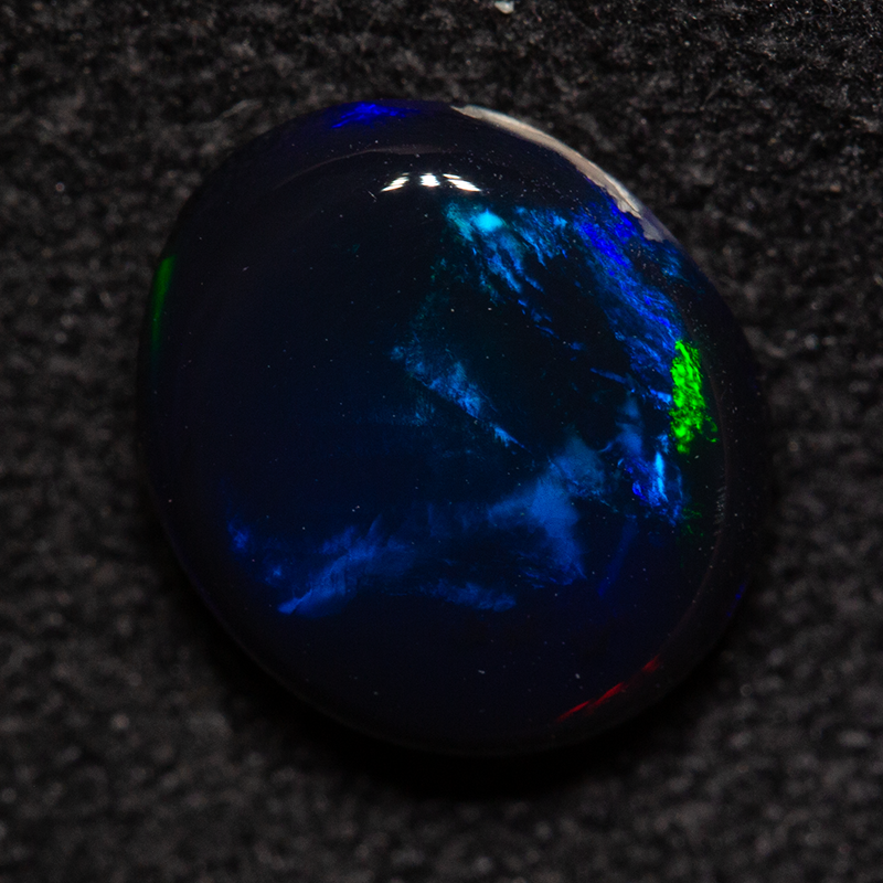 1.71 ct black opal 9x7.8x3.6mm