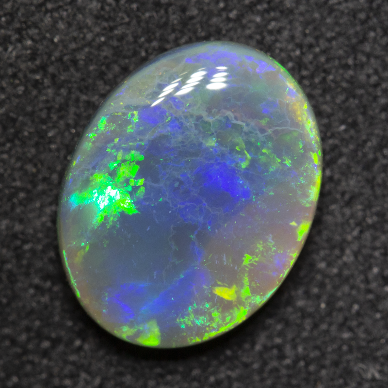 1.72 ct black opal 10.1x7.9x3.2mm